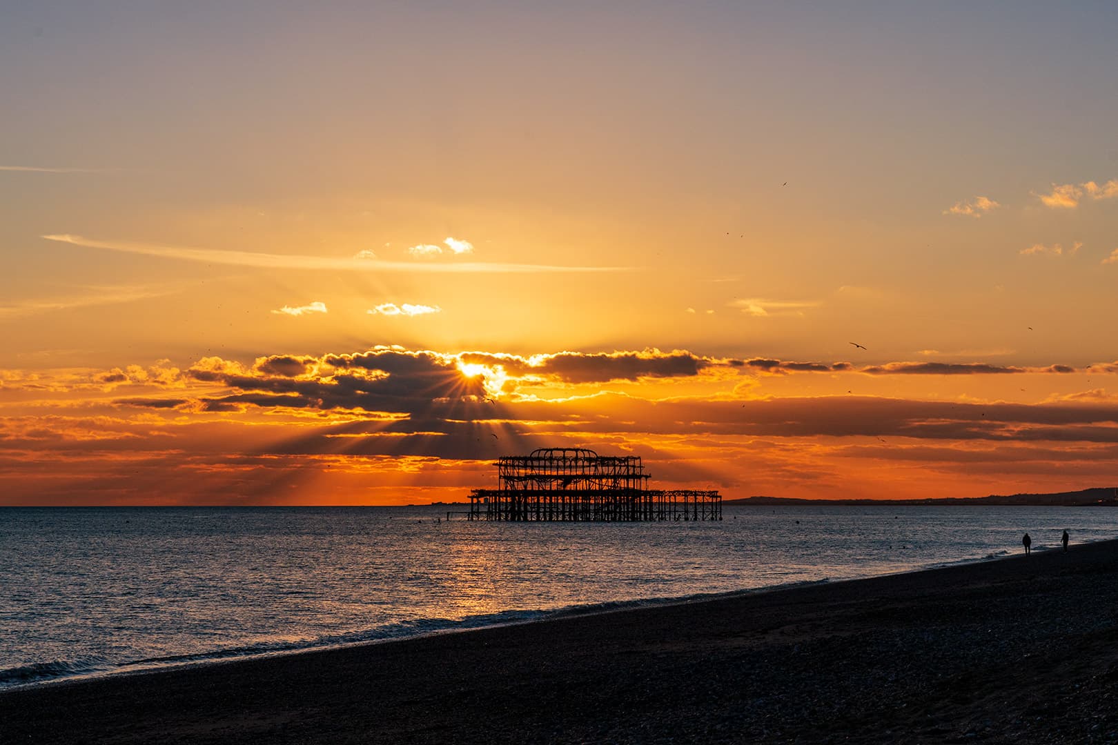 Sun Rays Through Brighton West Pier